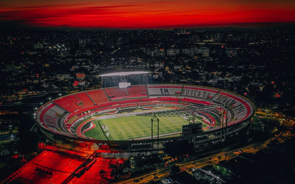 A stadium at night surrounded by a city, the kind of event several agencies protect at once